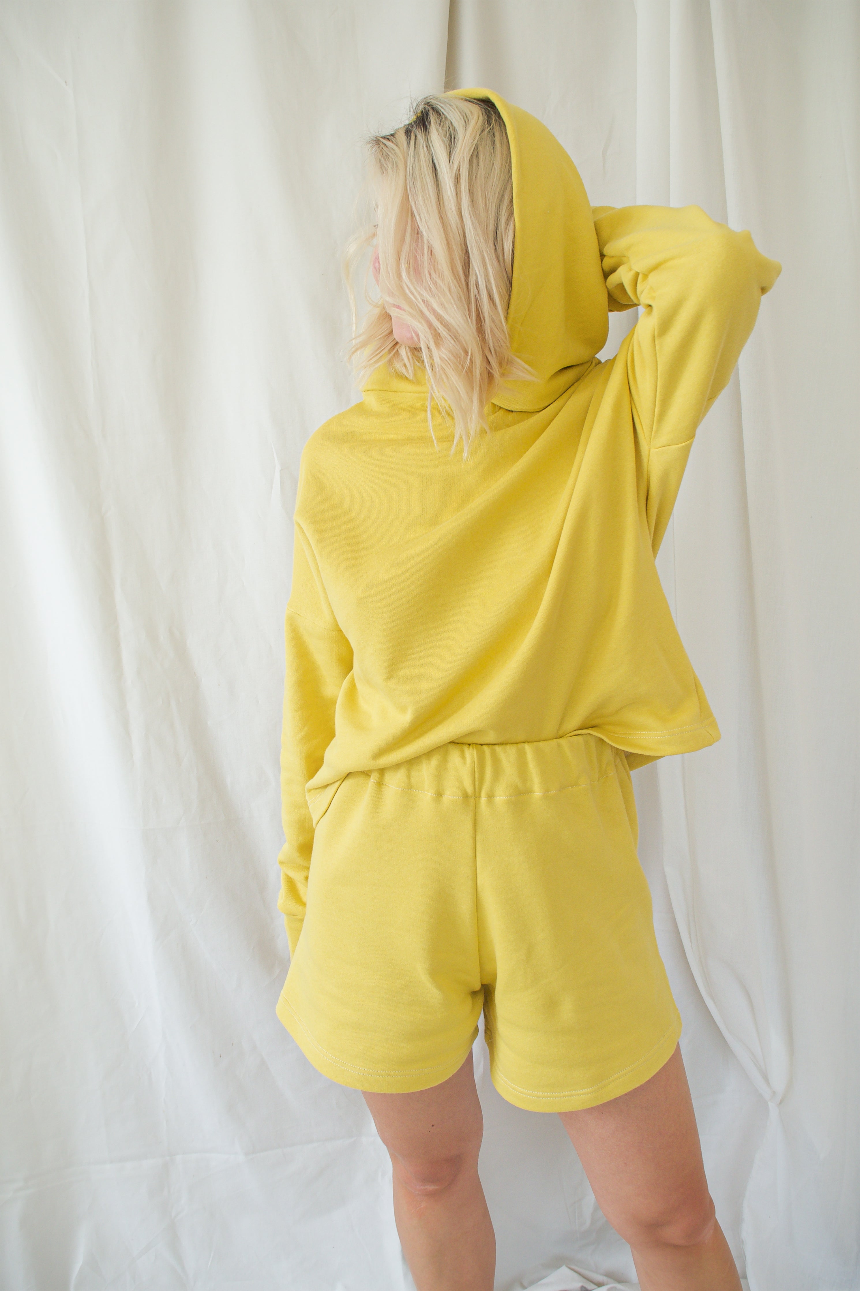 organic loungewear, organic tracksuit, yellow tracksuit, organic cotton, adva studios, ethically made, responsible fashion, organic yellow shorts, organic yellow hoodie